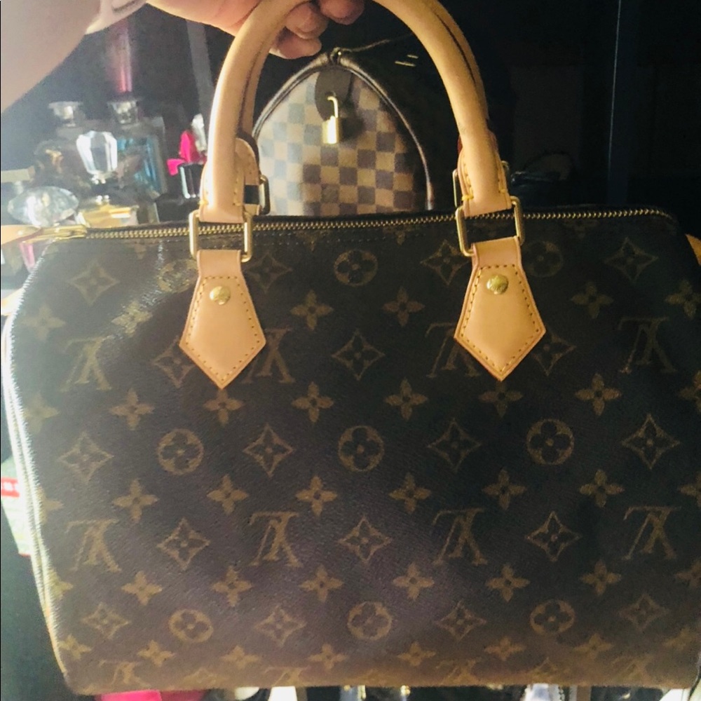 100% authentic LV